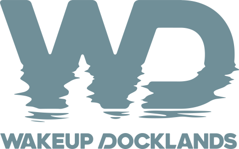 Logo with stylized 'WD' above 'WAKEUP DOCKLANDS' text.