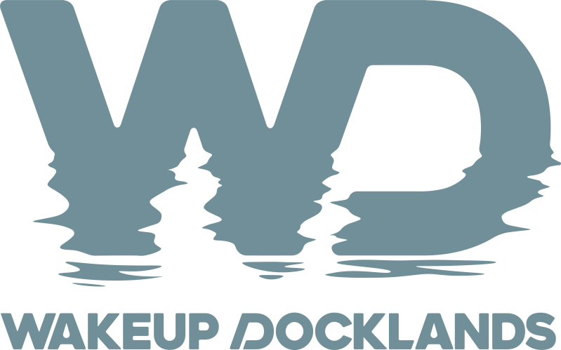 Logo with stylized 'WD' above 'WAKEUP DOCKLANDS' text.